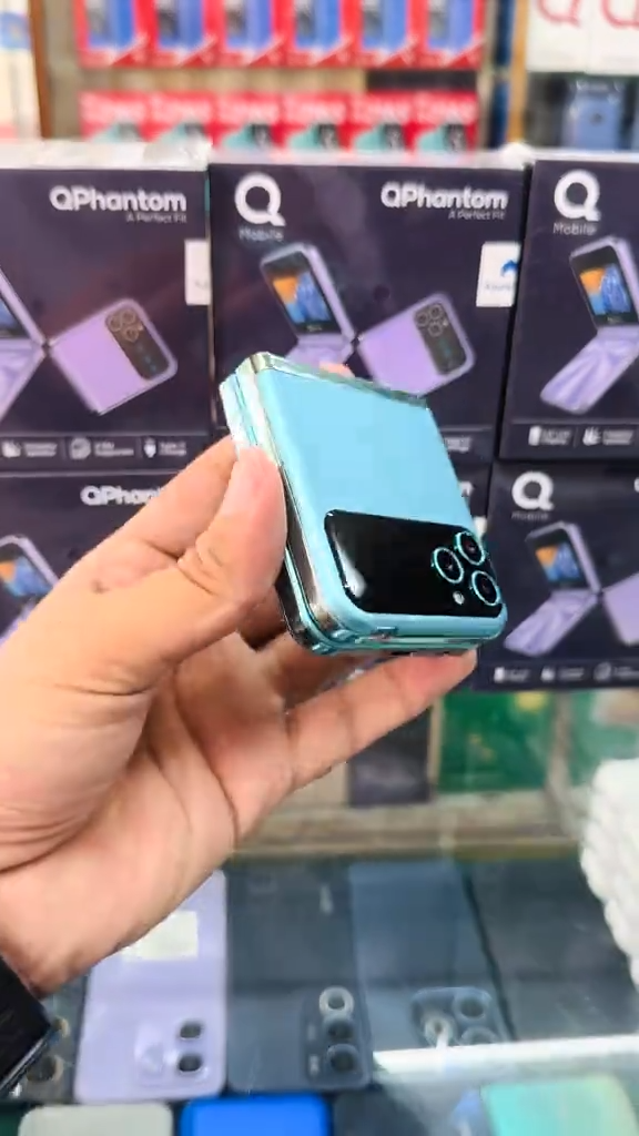 QMobile Phantom Fold 2.4 Inch Display PTA Approved Mobile With 1400mAh Battery 4 SIM Support And Type C Charger (Random Color)